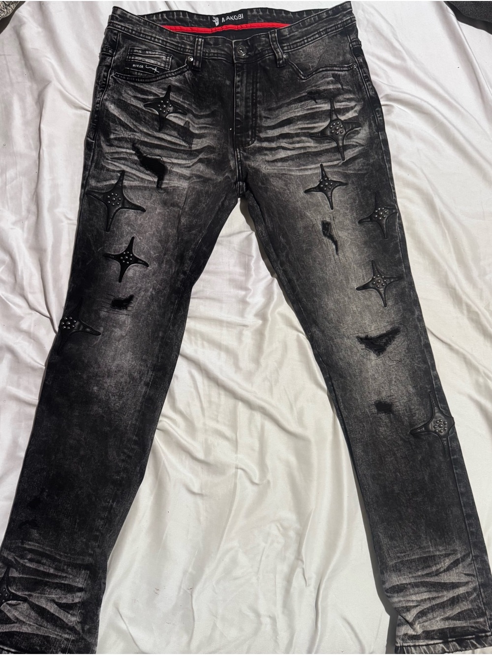 Men's Black Distressed Skinny Jeans with Studded Star Accents